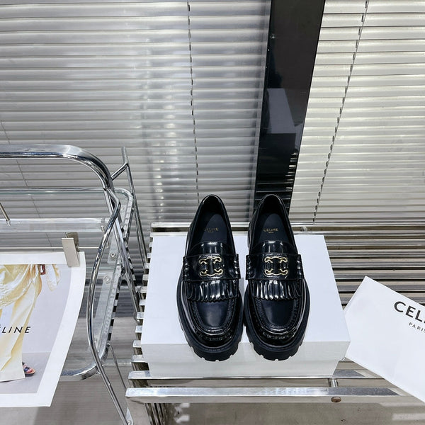 MARGARET CHUNKY LOAFER WITH FRINGES AND TRIOMPHE CHAIN IN POLISHED BULL BLACK