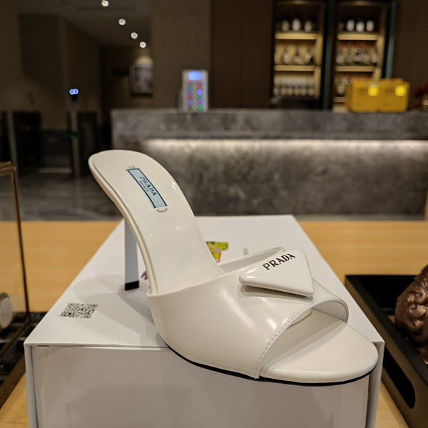 Prad 26s Open Toe Mules 100mm In Ivory White Patent Calfskin With Logo