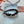 BLACK VOILE FABRIC HAIRBAND WITH PEARL CHAIN 867187