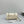 EXTRA POCKET L19 IN BISQUE BEIGE OSTRICH LEATHER
