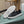 LV TRAINERS IN BLACK CALFSKIN AND MONOGRAM CANVAS
