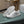 LV TRAINERS IN WHITE CALFSKIN AND MONOGRAM CANVAS