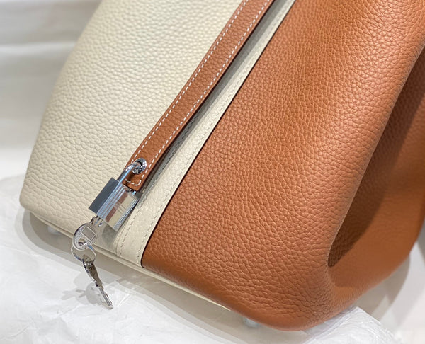 HM PICOTIN LOCK 22 TOGO LEATHER AND WHITE CALFSKIN