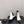SHORT BOOTS IN WHITE MIX BLACK SHEEPSKIN