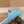 FURRY SLIDES IN SKY BLUE CURLY SHEARLING