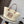 Medium anagram basket bag in iraca palm and calfskin