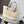 Medium anagram basket bag in iraca palm and calfskin
