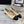 ballet flat beige black lamskin with multi logo