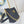 LOCK AND WALK 20 IN BLACK GRAINED CALFSKIN GOLD HARDWARE