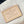 SPEEDY BANDOULIÈRE 20 IN WHITE MONOGRAM JACQUARD FABRIC AND BEIGE CALFSKIN TRIM
