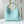 CARMEL 40 IN SKY BLUE MONOGRAM PERFORATED CALFSKIN