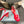 PRA TRIANGLE HEEL FLOWER MOTIF SATIN SANDALS RED
