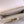 TWIST MM 23 IN QUARTZ WHITE EPI LEATHER GOLD HARDWARE
