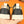 PRA TRAINER IN BLACK CALFSKIN AND TAN EMBROIDERED FABRIC