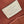 HAND IT ALL MM 32 IN CREAM MONOGRAM PERFORATE CALFSKIN SILVER HARDWARE