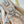 HAND IT ALL PM 29 IN BEIGE MONOGRAM PERFORATE CALFSKIN SILVER HARDWARE