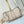 HAND IT ALL PM 29 IN BEIGE MONOGRAM PERFORATE CALFSKIN SILVER HARDWARE