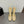 ALAIA SHORT BOOTS IN GOLD MESH FISHNET