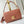SOFT TWIST 27 IN COGNAC CALFSKIN GOLD LOGO