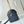 SPEEDY BANDOULIÈRE 25 WITH CRISS CROSS PATTERN IN BLACK LAMBSKIN