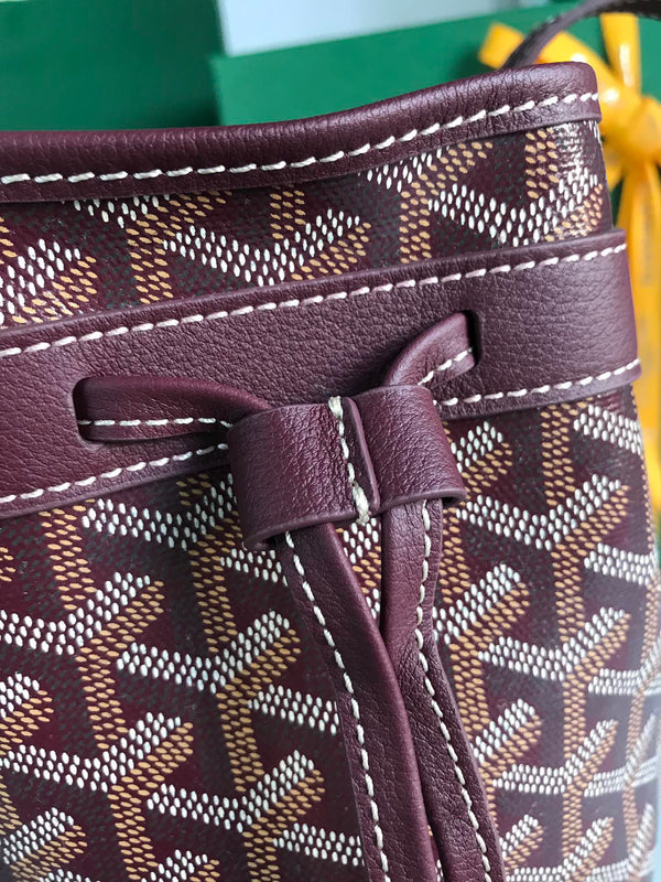 PETIT FLOT BUCKET BAG 22 IN WINE RED GOYARDINE CANVAS AND LAMBSKIN TRIM
