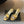 CC 2026s Pearl Camellia Sandals 7cm Gold Cowhide 719456