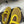 ALAIA BALLET FLATS IN YELLOW MESH FISHNET