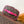 NICE MINI 20 TOILETRY POUCH IN ROSE RED MONOGRAM MACASSAR CANVAS
