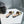 GG MATELASSÉ CANVAS SLIDES WHITE LOGO