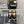 PEEP-TOE THICK SOLE SANDALS IN BLACK PATENT LAMBSKIN