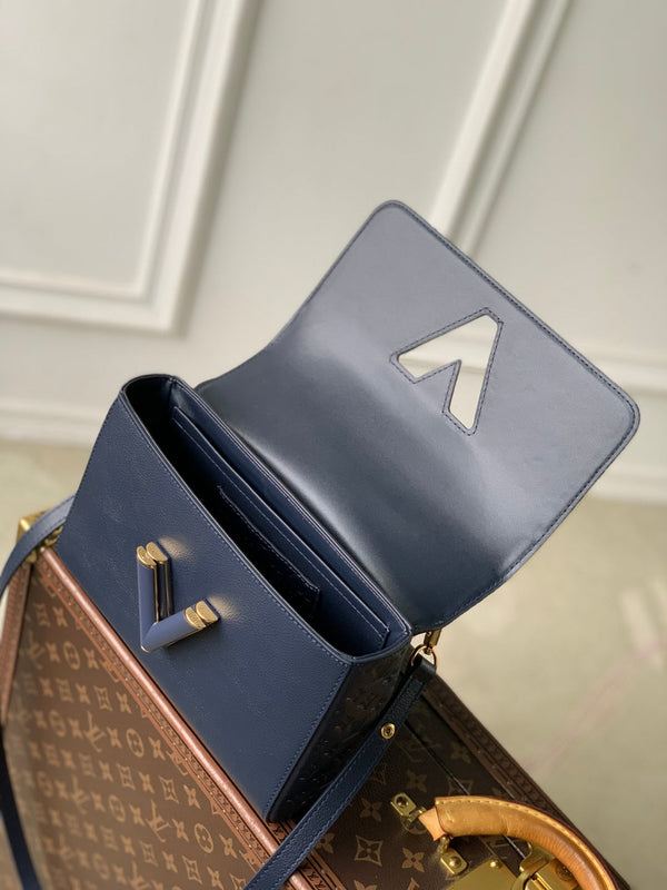 Twist MM Slim 23cm Dark Blue Calfskin 251410