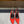 L'ENTRACTE SLINGBACK PUMPS IN RED SATIN