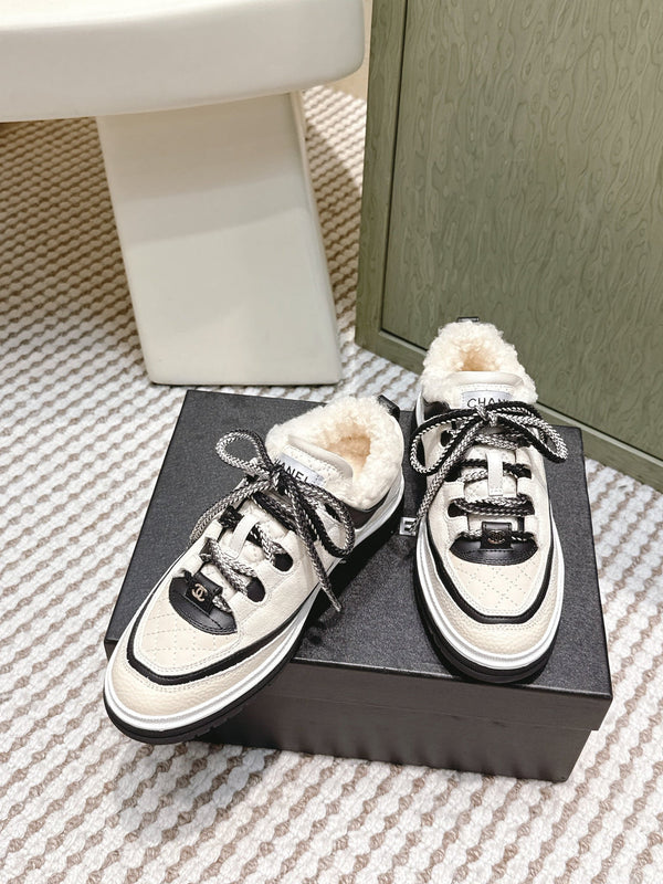 Chanel 26s Thick-Sole Sneakers In White And Black Calfskin With Fur Lining