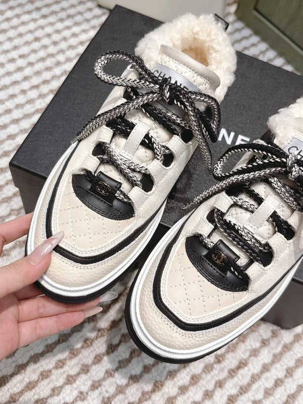 Chanel 26s Thick-Sole Sneakers In White And Black Calfskin With Fur Lining