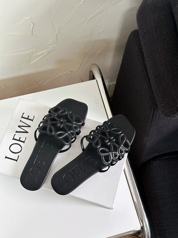 Petal Anagram Slide in Black Soft Calfskin 273512