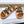 TIPPI SLIDE IN CANVAS & CALFSKIN NATURAL BROWN CREAM/ BLACK