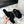 CROSS STRAP SLIPPER IN BLACK SHEARLING