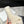CROSS STRAP SLIPPER IN WHITE SHEARLING