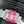 WOVEN SLIDE IN RAFFIA AND BRIGHT PINK LAMBSKIN