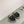 CC SLIPPERS WITH SILK BOW IN BLACK COWHIDE