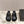 Alaia 2025 Vienne Cutout Kitten-Heel Slide Sandals Black Leather 293648