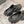 CUT-OUT MULES IN BLACK RUBBER