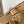 SPEEDY BANDOULIÈRE 20 IN MILK TEA MONOGRAM EMPREINTE LEATHER