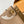 ONTHEGO PM 25 IN MILK TEA MONOGRAM IMPREINTE LEATHER