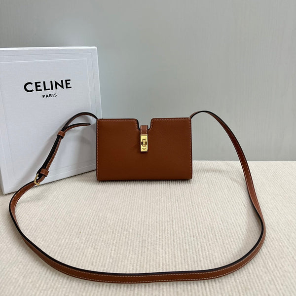 16 STRAP POCHETTE 18 IN BRONZE ORANGE SUPPLE CALFSKIN GOLD HARDWARE