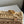TRIOMPHE 20 IN BEIGE RAFFIA GOLD HARDWARE