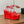 ALAIA BANQUET WEDGE SANDALS IN CHERRY RED LAMBSKIN WITH RED HEART