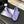 BALLET FLATS IN PASTEL PURPLE SUEDE WITH CAMELLIA