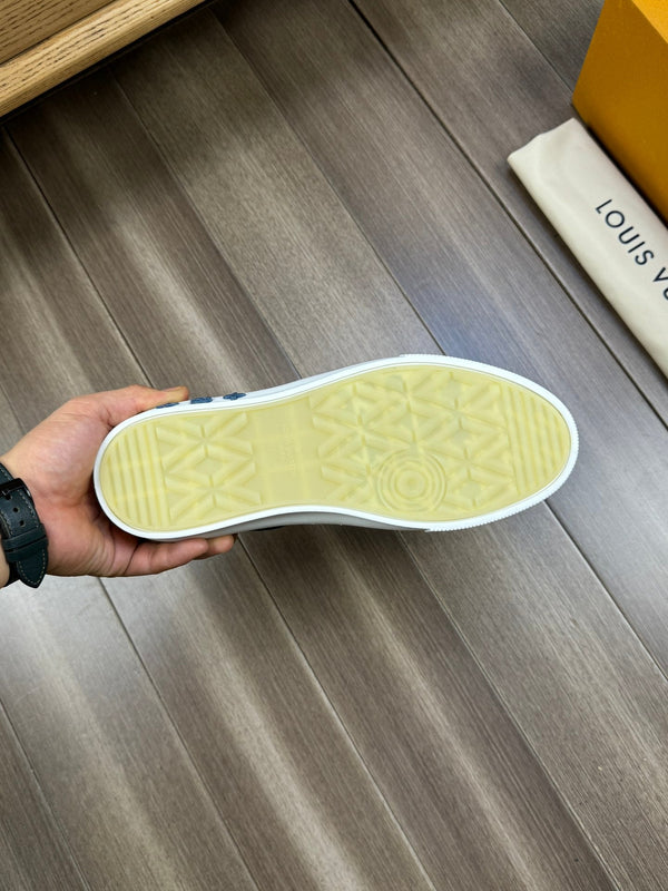 LV TRAINER SNEAKER IN BLACK AND BLUE MONOGRAM DENIM