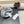 STRIPED KNITTED HAT IN LIGHT GRAY WOOL 424514